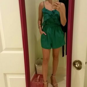 Super cute green romper with ruffles