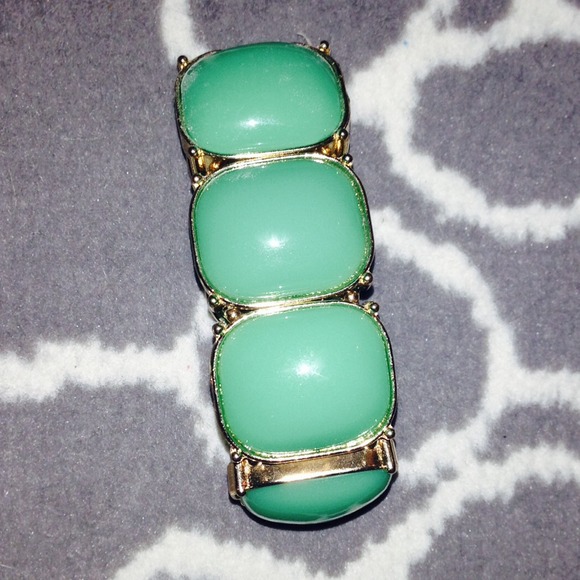 Gold and emerald bracelet.