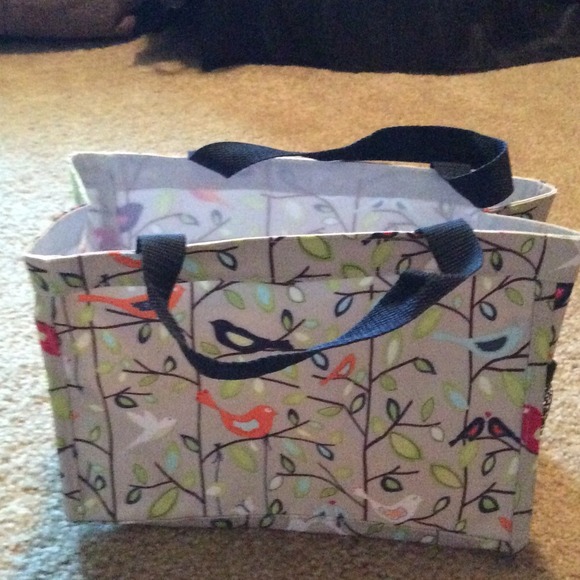 Brand new thirty-one organizer with side pockets.