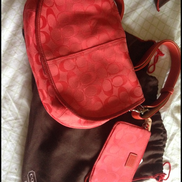 Coral Coach bag with matching wristlet