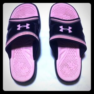 Pink and black Under Armour slide sandels