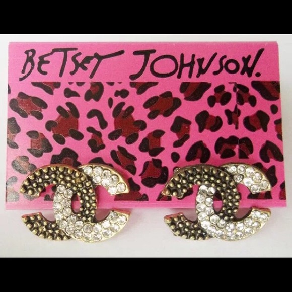 White and gold Betsy Johnson earrings with black