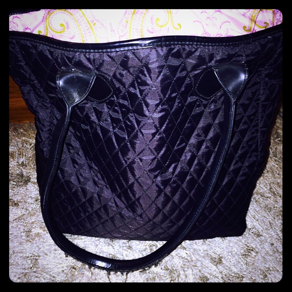 Brookstone black quilted "Go Anywhere Tote"