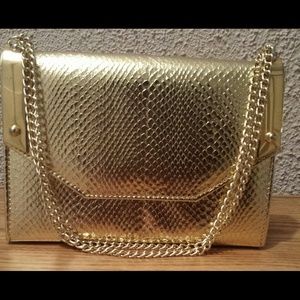 Gold mini flap bag