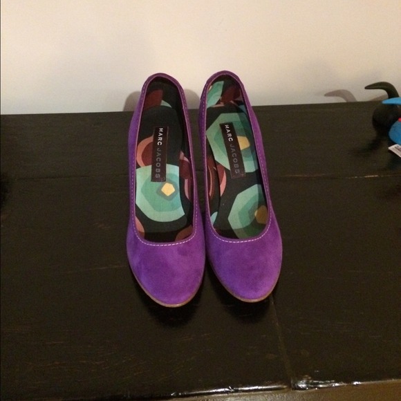 Very pretty purple shoes. Never worn.