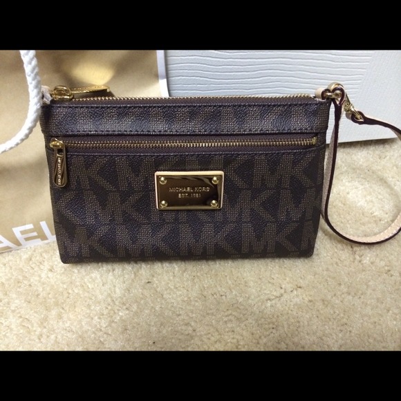 Michael Kors wristlet 100% Authentic and brand new