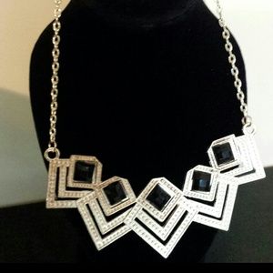 Gold necklace with black stones