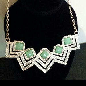 Gold necklace with MediumSeaGreen stones