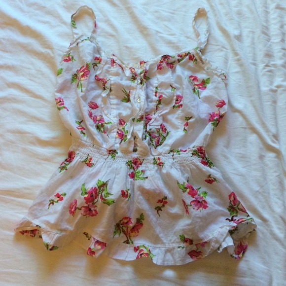 Ruffle tank top with peplum style bottom.