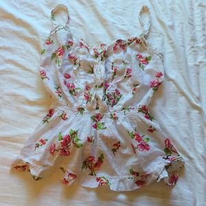 Ruffle tank top with peplum style bottom.