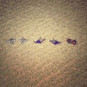 angel, dinosaur, and lady bug earrings