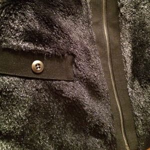 Faux fur black jacket. Very cute. Never worn!