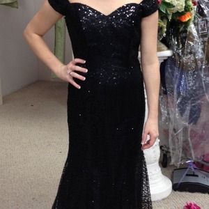 Black sequin, mermaid fit prom dress.
