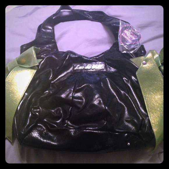 Black Lux De Ville purse with green bows