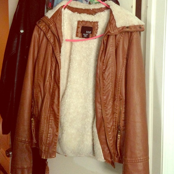Brown leather jacket with fur interior