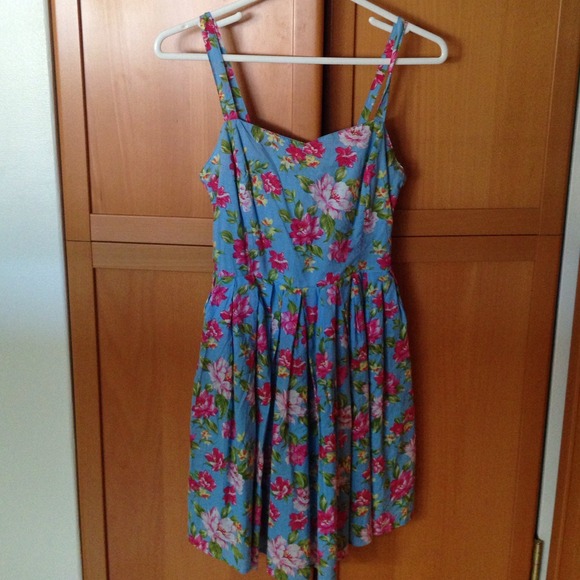 Flowery dress. Never been worn.
