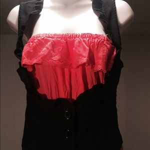Cute ruffled vest.