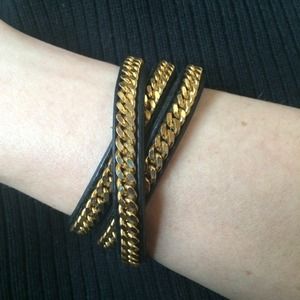 Gold tone chain and leather wrap bracelet by Vita