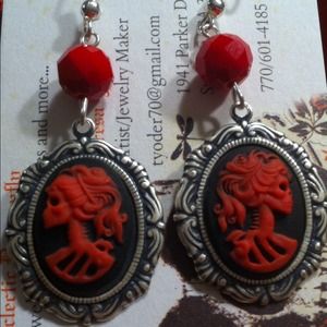 Handmade skull cameo earrings.