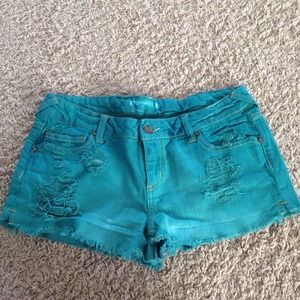 Turquoise real distressed denim shorts