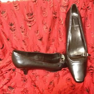 Black kitten heel shoes.