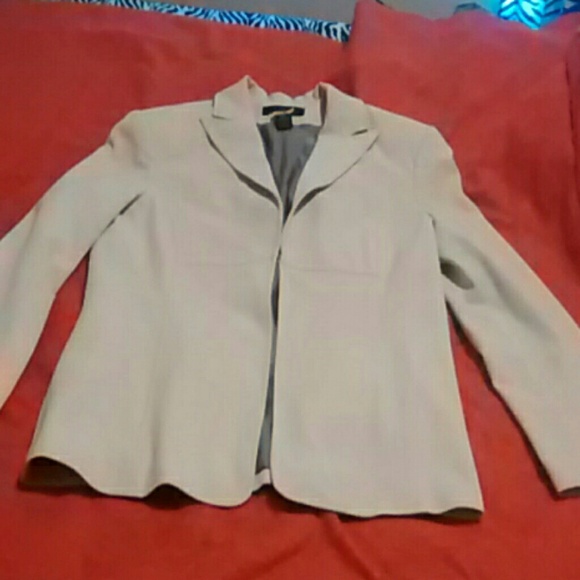 Cream colored blazer.