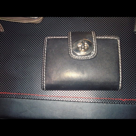 Black Coach wallet with turn-lock closure