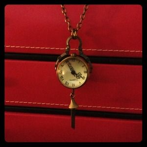 Unique, magnifying glass clock necklace