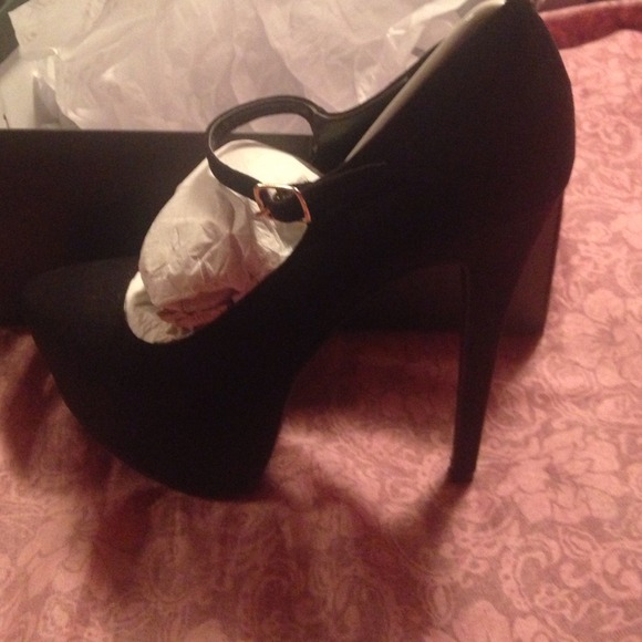 Black suede Mary Jane pumps