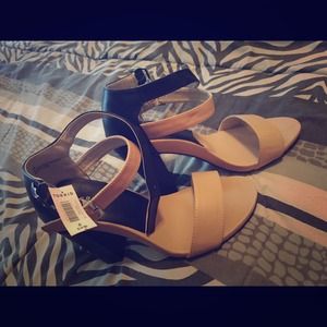 Tan and black chose cute shoes from torrid size 8