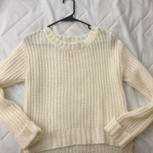 Knitted sweater, with gold threading.