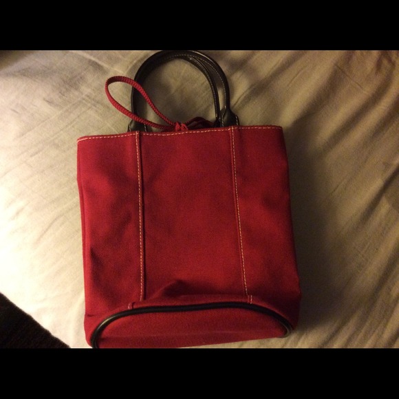 Red leather handle DKNY bag...