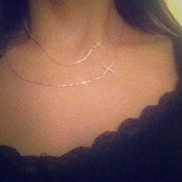 Sterling silver sideways cross necklace