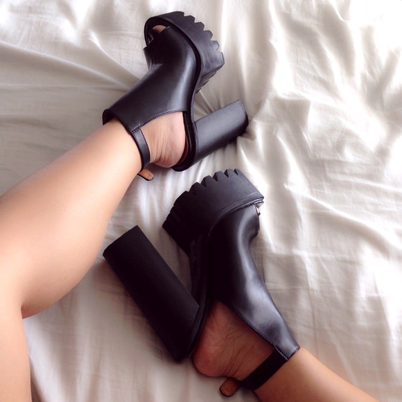 Black leather platform peep toe sling back heels