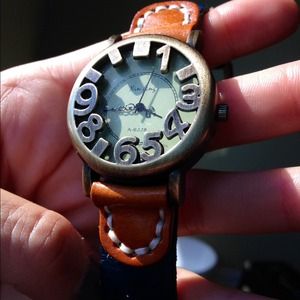 Xin feng metal and leather watch