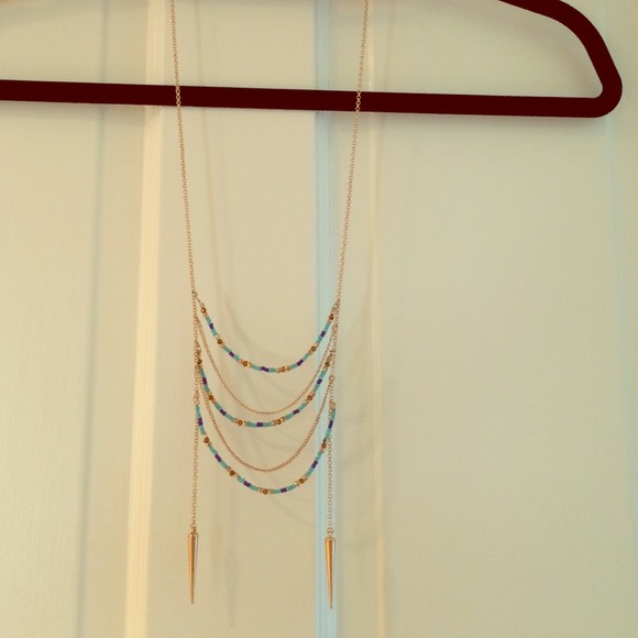Blue bead and gold necklace