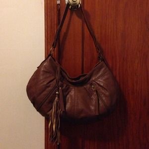 Brown purse with tasseled zipper