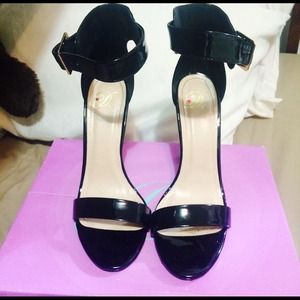 Black strap heel. NWOT