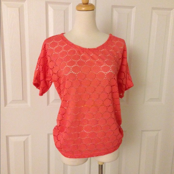 Bright orange knit top