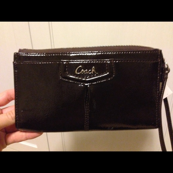 Brand new brown Coach wristlet