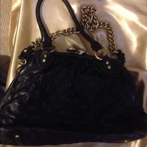 Purple faux leather satchel