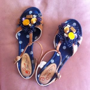 Navy polka-dot sandals.