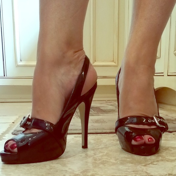 Black patent leather peep toes with buckle