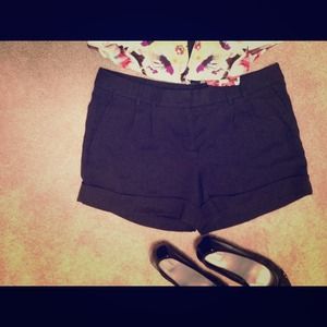 Express black cuffed and pleated black shorts