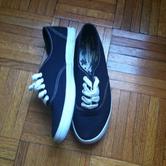 Navy blue slip on sneakers