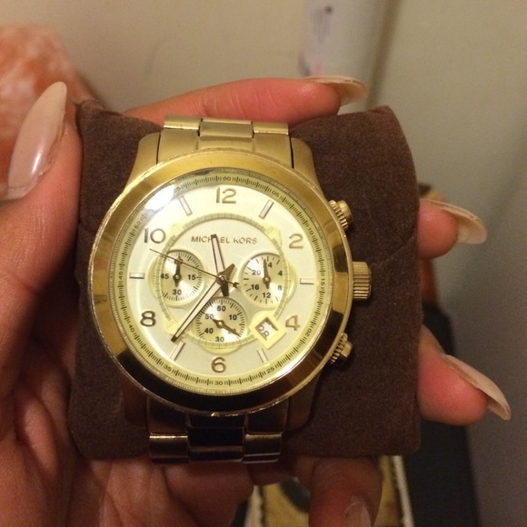 NEGOTIABLE - Oversized MK gold toned watch main image 4