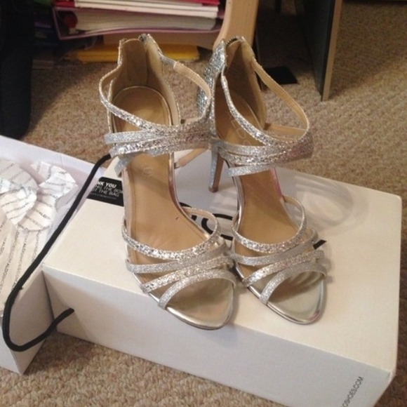 Brand new shiny silver heels