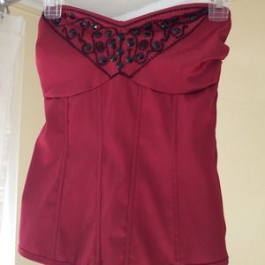 Red corset with black beading