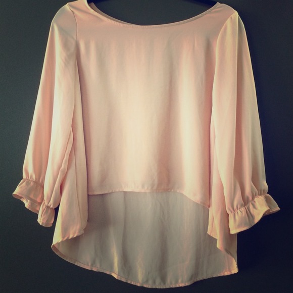 Peach Ruffled Sleeved High Low Top!