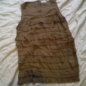 Brown frilly over shirt.